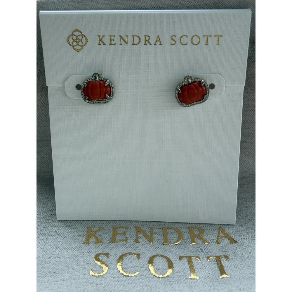 Kendra Scott's red pumpkin earrings